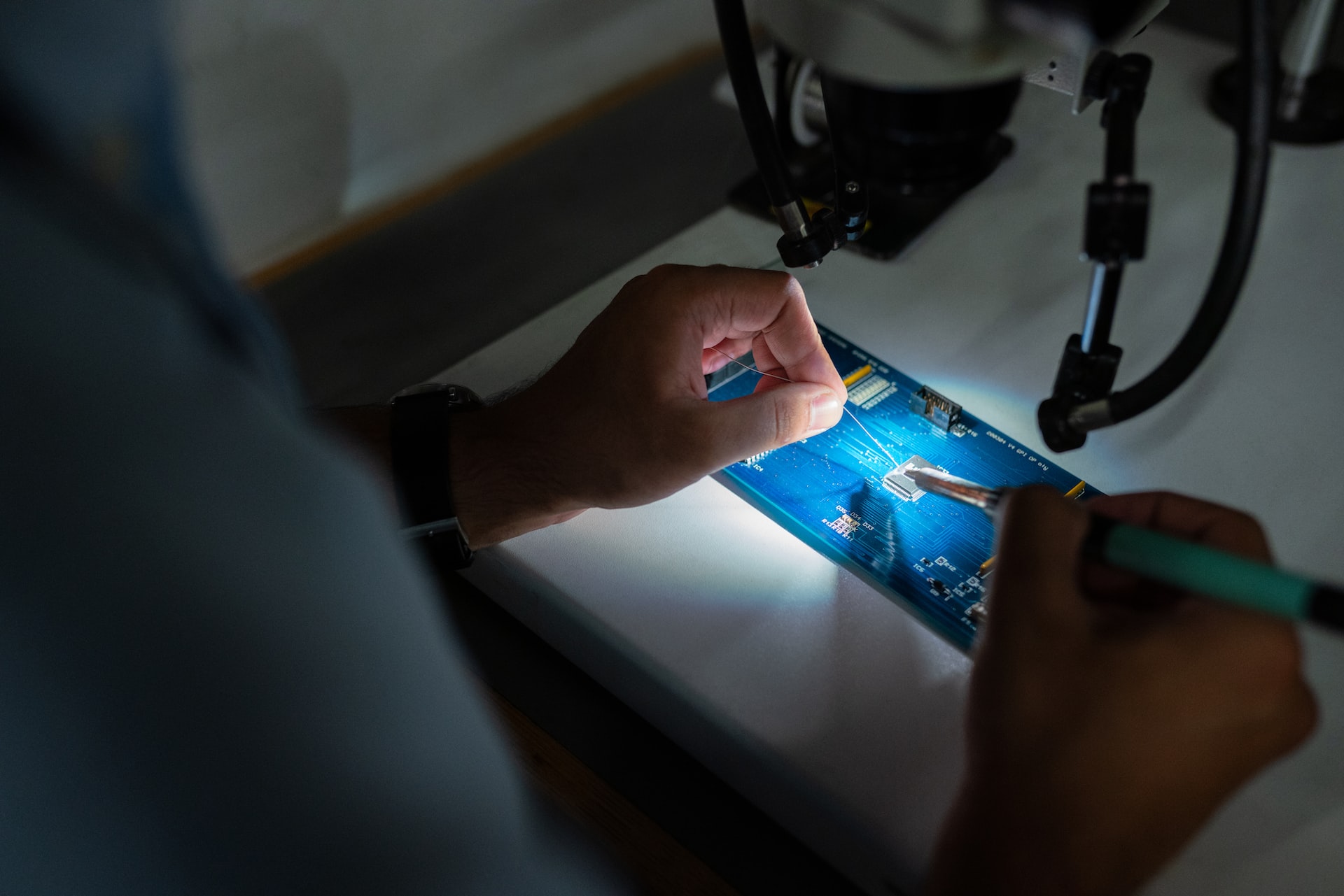 Technology laser project A person working on a technology project using laser